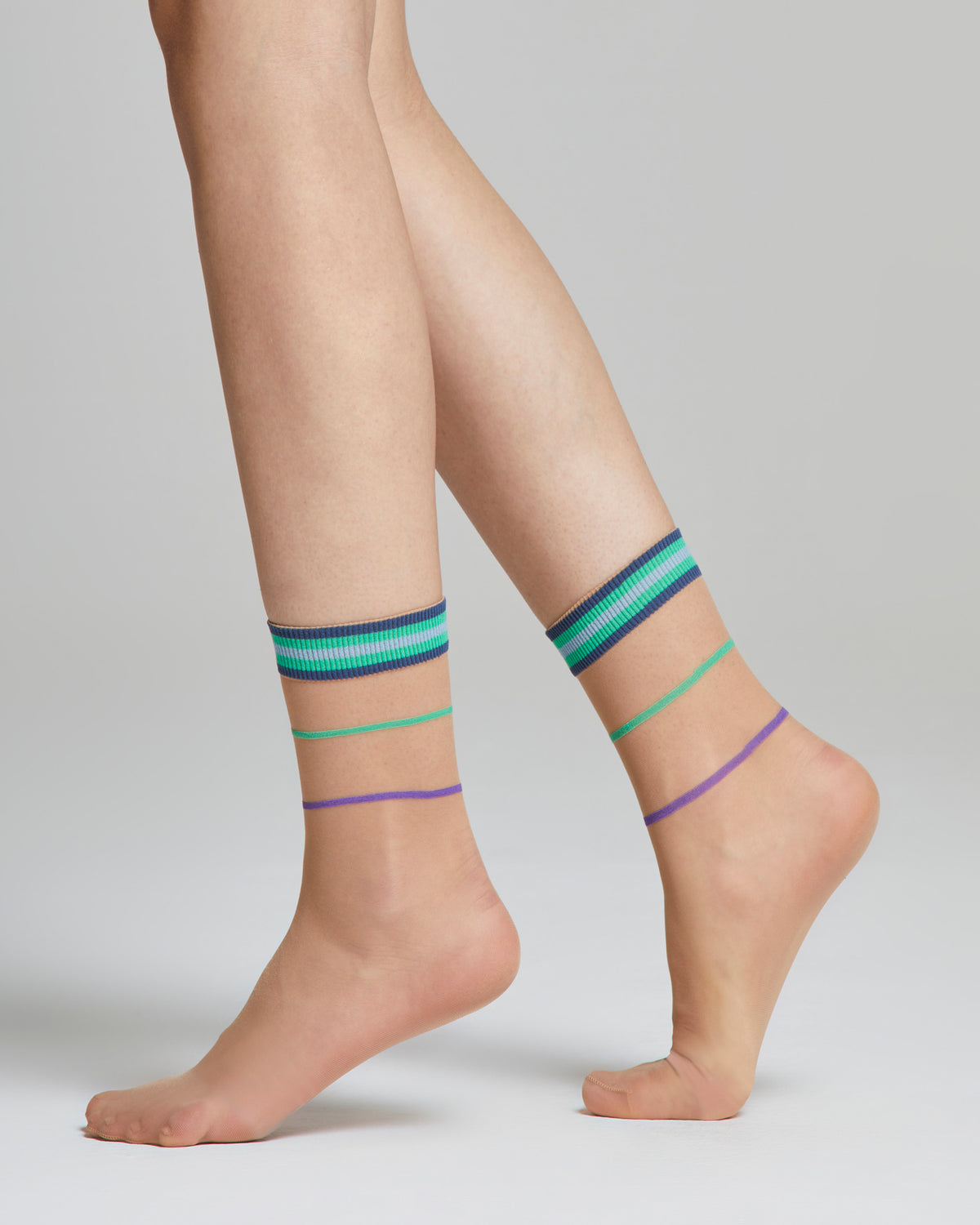 Transparente Tulipano-Socke mit farbigen Streifen und Bündchen