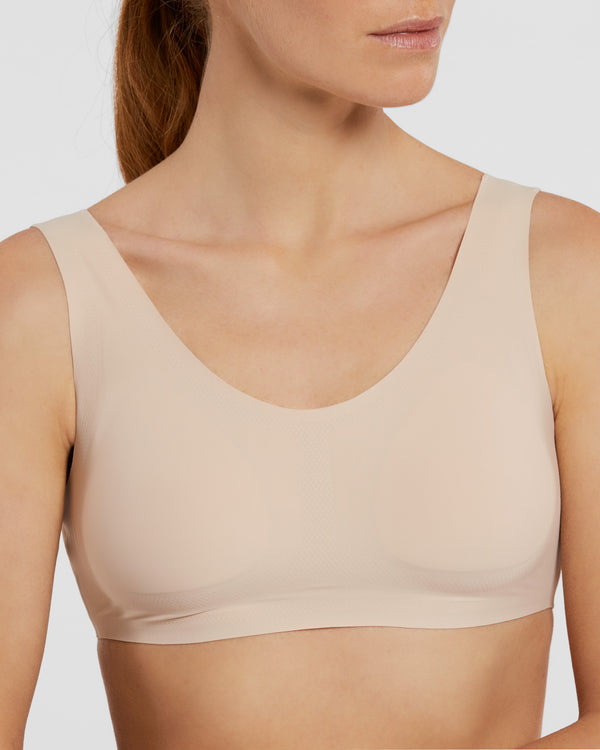 Brassière à liaison élastique