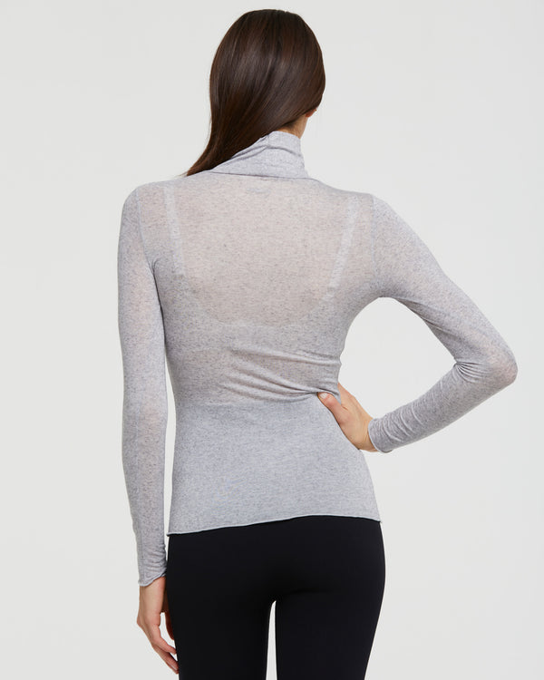 Women's grey turtleneck sweater